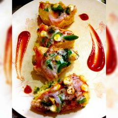 A picture of Dhokla pizza.