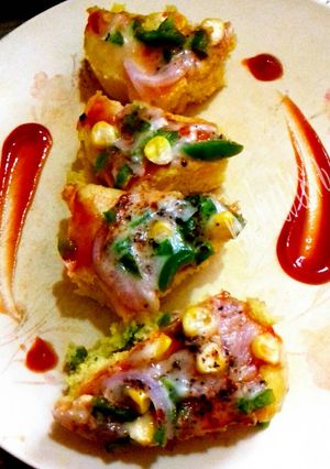 A picture of Dhokla pizza.
