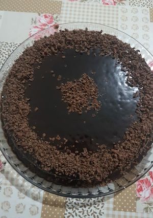 A picture of Choco cake with Chocolate ganache topped with Chocolate scrapes.