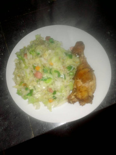 A picture of Rice,Cabbage with grilled chicken.