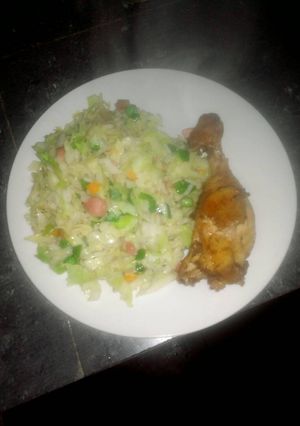 A picture of Rice,Cabbage with grilled chicken.