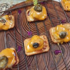 A picture of Tucfrizza (tuc pizza fries).