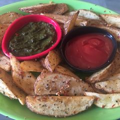 A picture of Potato wedges.