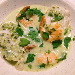 A picture of Seafood with homemade green curry.