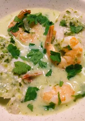 A picture of Seafood with homemade green curry.