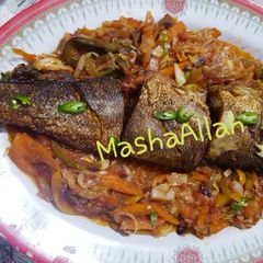 A picture of Shallow Fried seabass with stirfry veg.