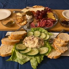 A picture of Charcuterie board / cheese board.