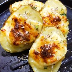 Cheesy stuffed potatoes A picture of Cheesy stuffed potatoes.