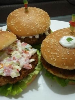 A picture of Crispy fish & potato burgers with mayo salsa😋🍔.