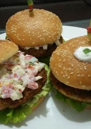 A picture of Crispy fish & potato burgers with mayo salsa😋🍔.