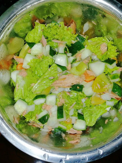 A picture of Salad in Home Made Vinaigrette Dressing.