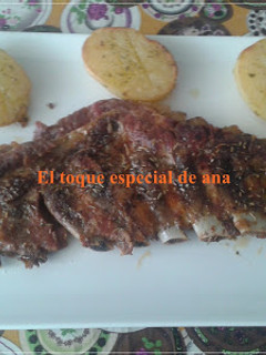 Una foto de Costilla al horno de cerdo con especies