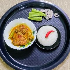 A picture of High Protein Rohu Curry with Mustard Paste.