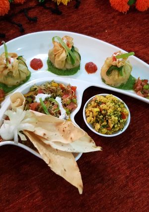 A picture of Spinach-Paneer bhurji potli with mango salsa.