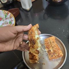 A picture of Cheesy corn garlic bread sticks.