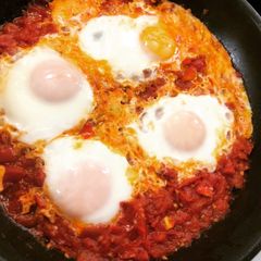Fried Eggs in Tomato Sauce A picture of Fried Eggs in Tomato Sauce.