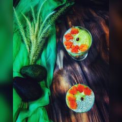 A picture of - Avocado Milkshake with chia seeds,Layered with Papayas & Vanilla Sponge Cake.