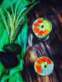 A picture of - Avocado Milkshake with chia seeds,Layered with Papayas & Vanilla Sponge Cake.