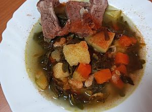 Foto principal de Potaje de berros con costillas