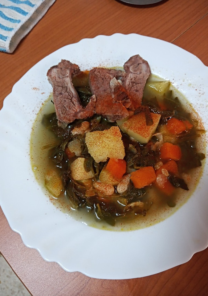 Una foto de Potaje de berros con costillas