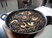 Una foto de fumet para arroz negro