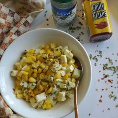 A picture of Cottage cheese, corn & egg salad.