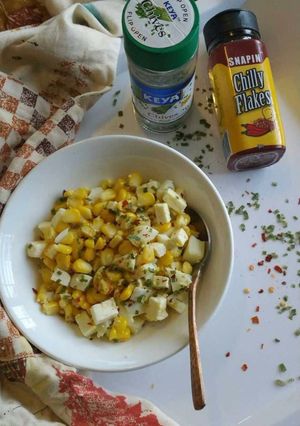 A picture of Cottage cheese, corn & egg salad.