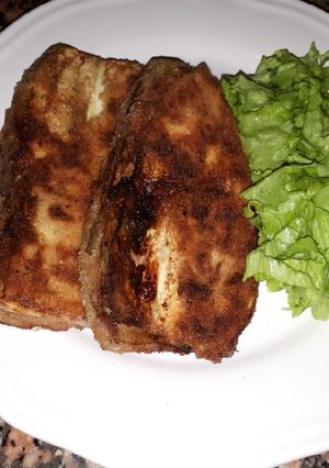 Una foto de Filetes de berenjena rellenos de jamón serrano y queso