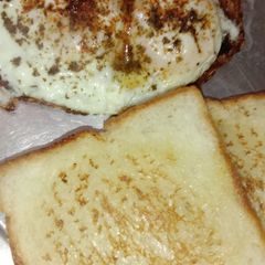 A picture of Egg with bread.