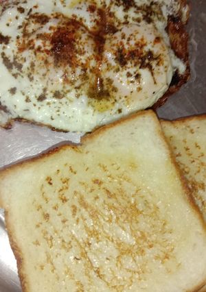 A picture of Egg with bread.