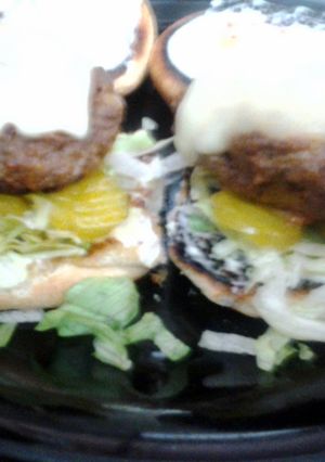 A picture of cheesy ranch burgers.