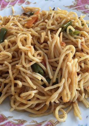 A picture of Spaghetti with vegetables.