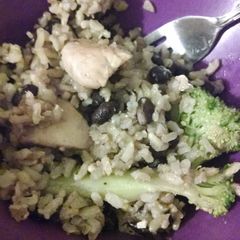A picture of Chicken with broccoli, black beans and rice.