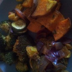 A picture of Roasted vegetables and chicken.