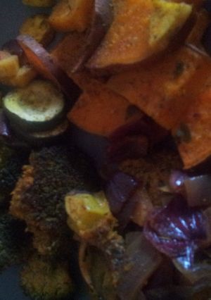 A picture of Roasted vegetables and chicken.
