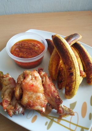 A picture of Oven grilled plantain and drumsticks with Ally sweet pepper sauc.