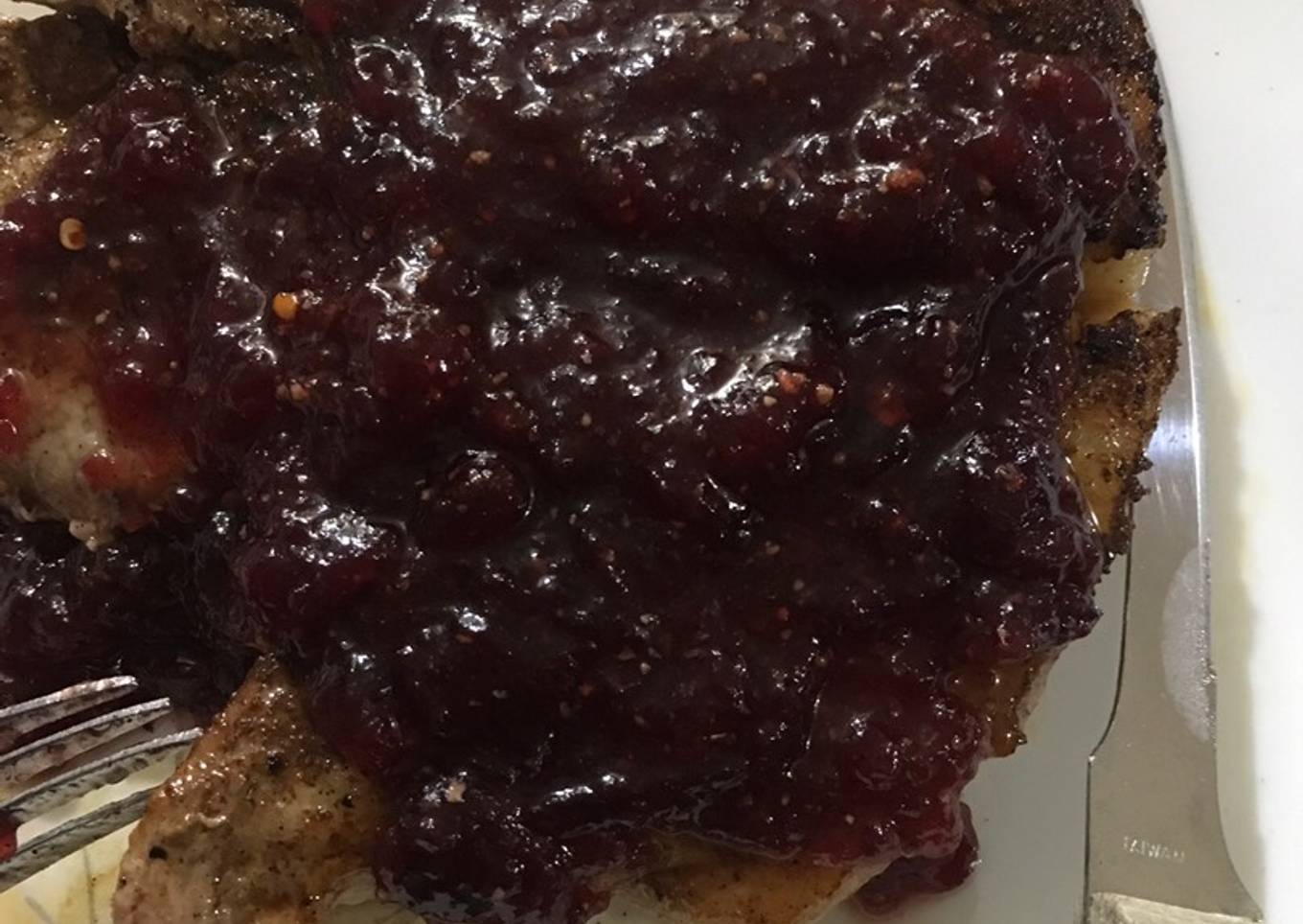 Pork with spicy orange cranberry sauce