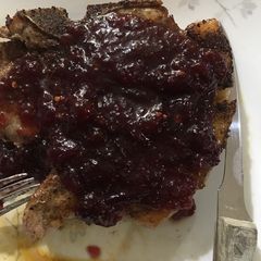 Pork with spicy orange cranberry sauce A picture of Pork with spicy orange cranberry sauce.
