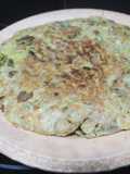 Tortilla de menestra y patatas de bolsa