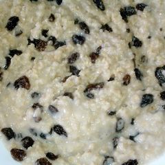 A picture of Almond Milk Oatmeal with Raisins.