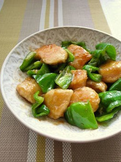 A picture of Chicken Breast Sautéed in Ginger and Soy Sauce with Seasonal Green Peppers.