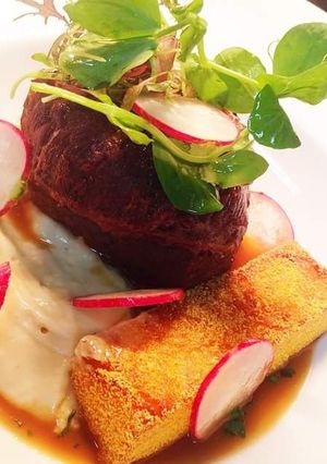 A picture of Beef cheek, oyster, polenta chip.