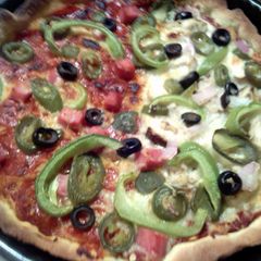 A picture of sunshine pizza pie.