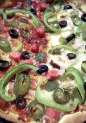A picture of sunshine pizza pie.