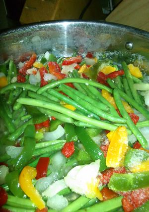 A picture of Green beans s and bell pepper onion mix up.