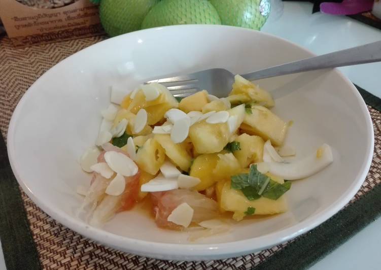 Tropical mixed fruits with ginger dressing