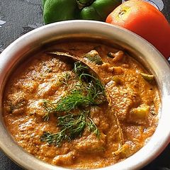 A picture of Capsicum with gravy.