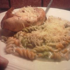 A picture of Brad's chicken au vino with artichoke parmesan Alfredo.