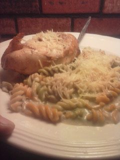 A picture of Brad's chicken au vino with artichoke parmesan Alfredo.