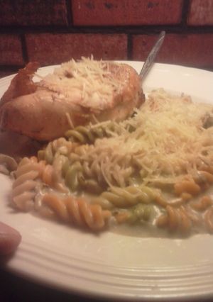 A picture of Brad's chicken au vino with artichoke parmesan Alfredo.
